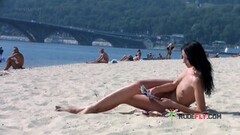 Fun Skinny nude beach girl filmed on a video by a voyeur Thumb